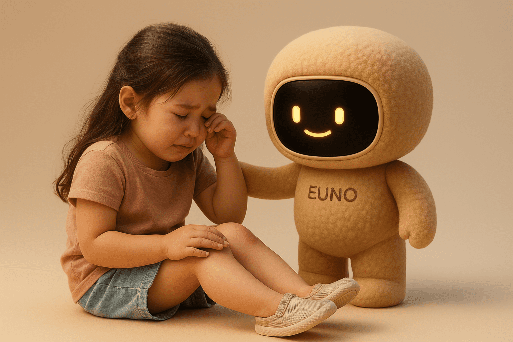 Robot Euno réconfortant un enfant qui pleur après être tombé